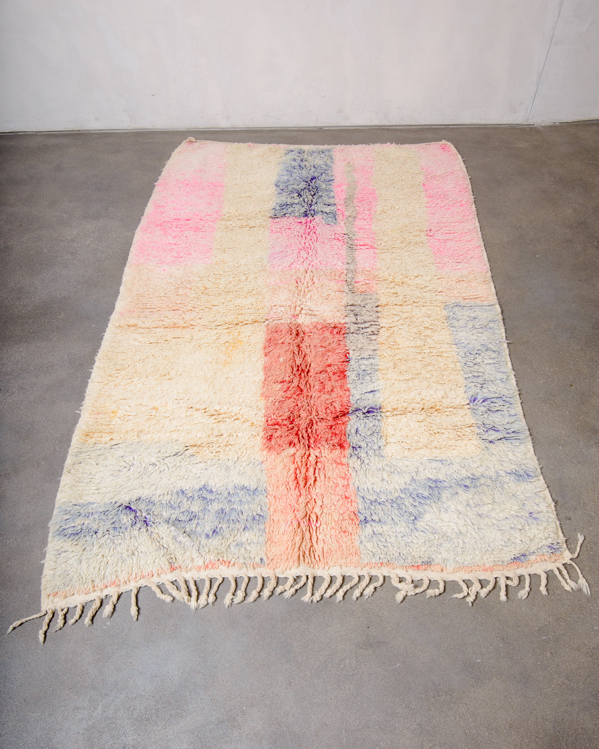 Modern, designer, handcrafted Berber rug from Morocco. Vintage carpet with beautiful colours and patterns and fluffy texture.